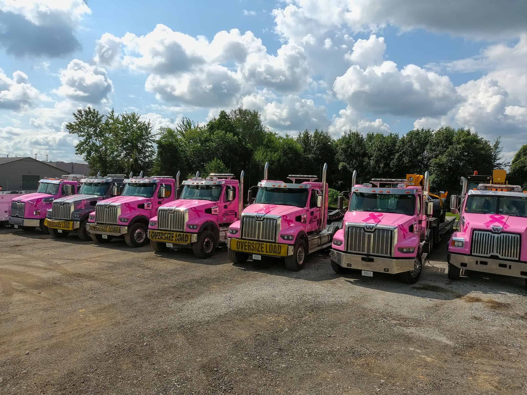 LC Hauling trucks and equipment with Western Star branding